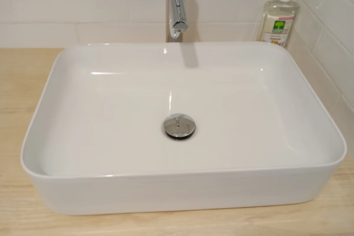 Modern bathroom sink on a wood vanity