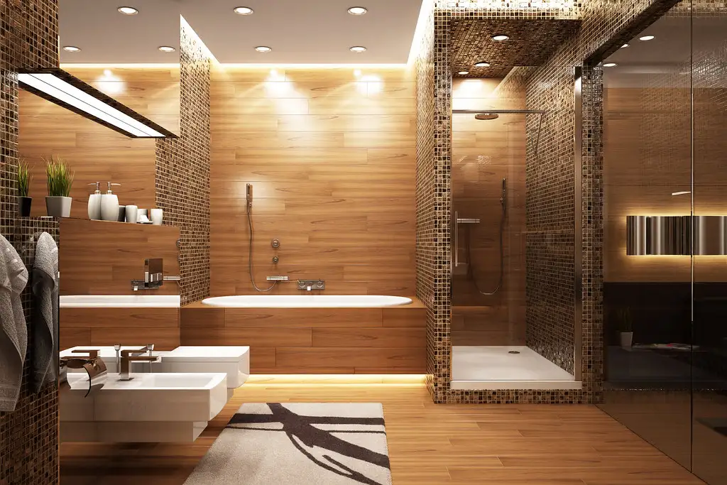 Glass shower and tiled wall showing fixture placement