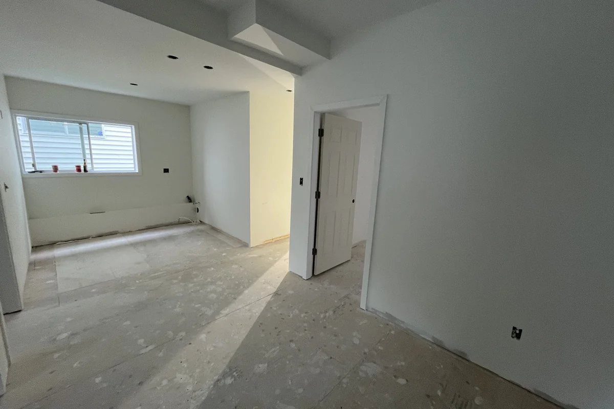 New drywall ceiling and bulkhead in a suite under construction
