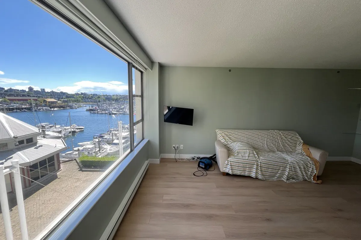 Vancouver condo with new flooring and a view over False Creek