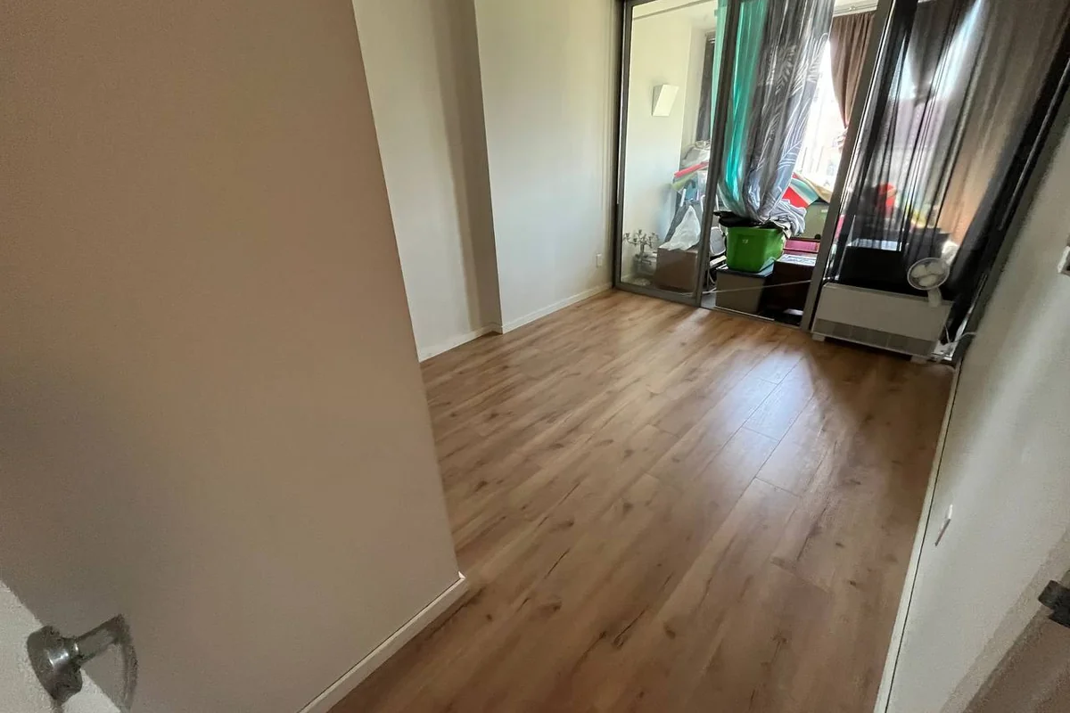 Warm wood flooring installed in a renovated Vancouver home