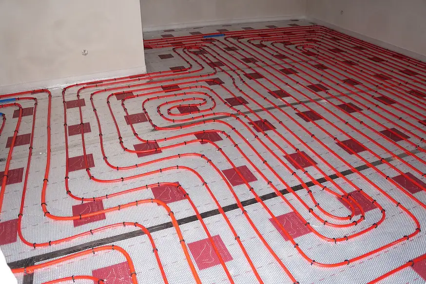 Hydronic radiant floor heating tubing laid out before the floor is finished