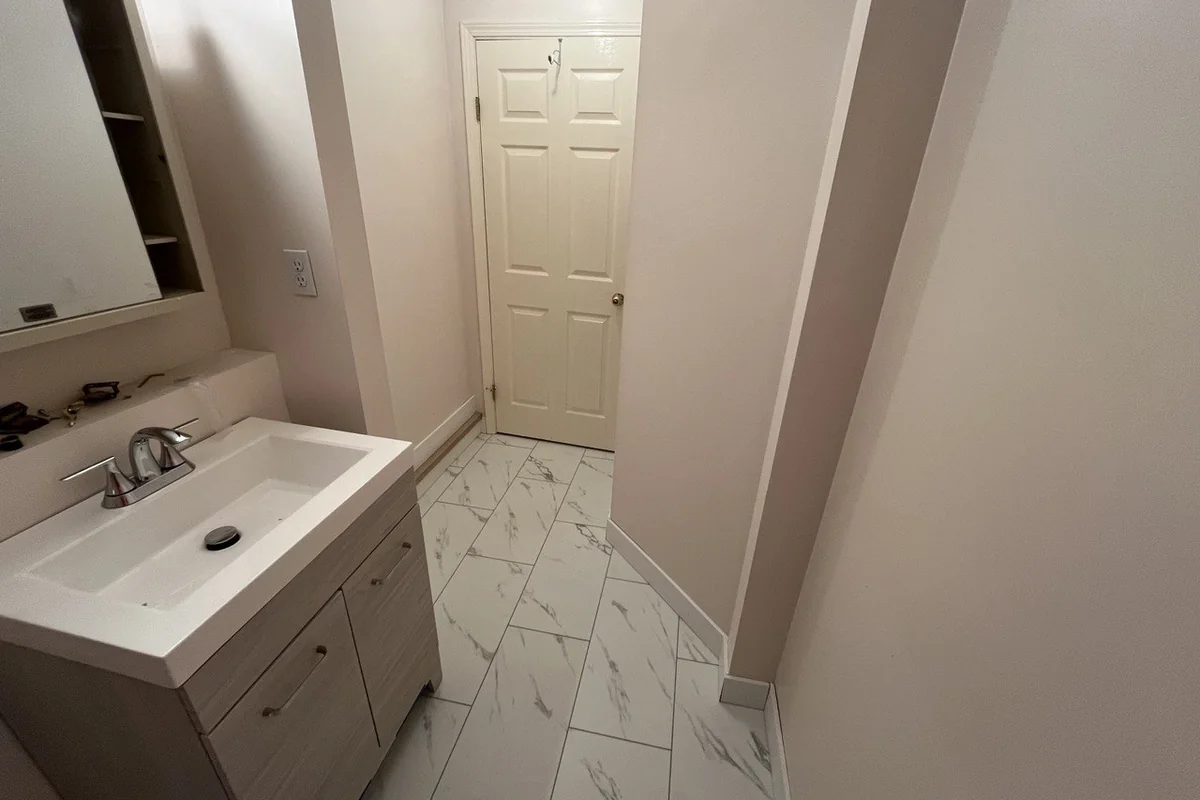 Porcelain floor tile in a renovated bathroom